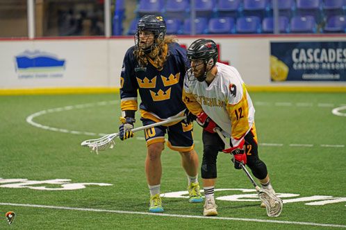 Lacrosse Spieler auf dem Rasen