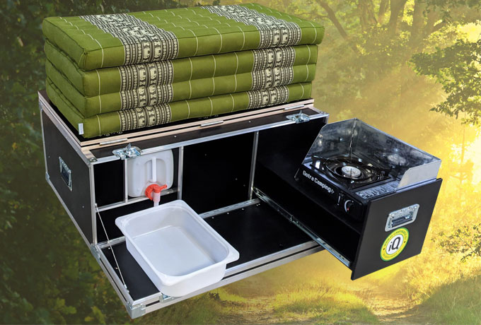 Schwarze iQ-Campingbox mit grüner Kapok-Matratze